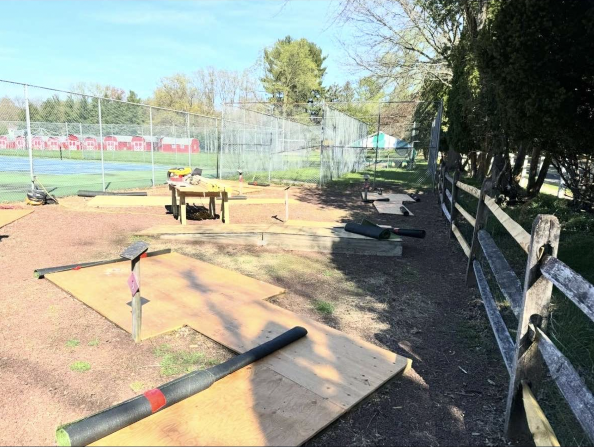 Gluing the wood boards before laying the turf out